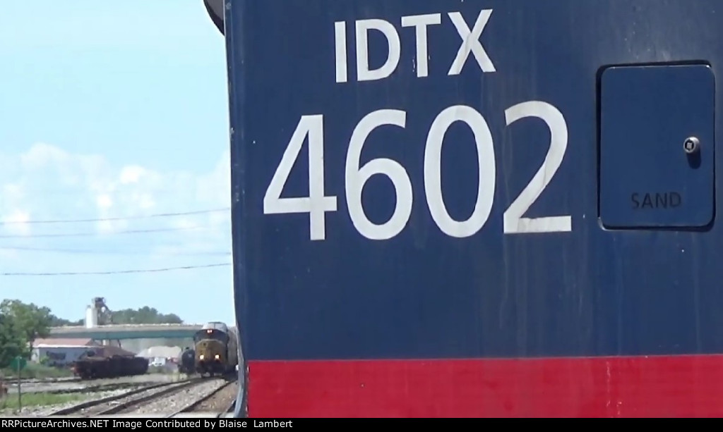 Amtrak and a CSX waiting in the background